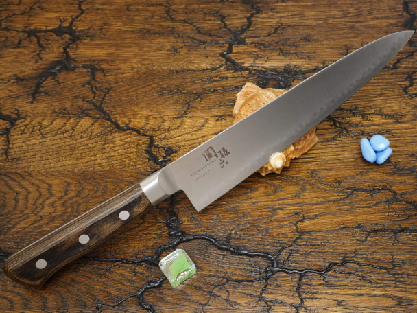 Кухонный нож KAI 10000CC Gyuto AE-5164, композитная высокоуглеродистая сталь, лезвие 21 см. Кухонный нож KAI 10000CC Gyuto AE-5164, композитная высокоуглеродистая сталь, лезвие 21 см.