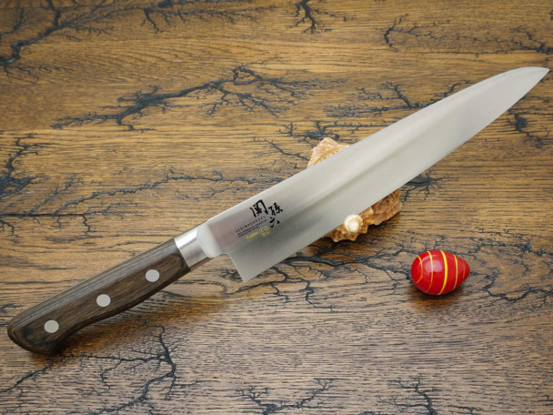 Кухонный нож KAI Kujaku Gyuto AE-5453, нержавеющая сталь DSR1K6, лезвие 24 см. Кухонный нож KAI Kujaku Gyuto AE-5453, нержавеющая сталь DSR1K6, лезвие 24 см.