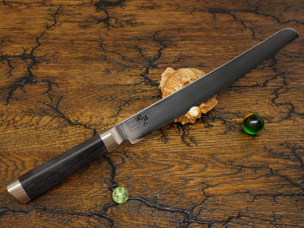 Кухонный нож KAI Damascus Bread AE-5207, нержавеющая сталь VG-MAX, лезвие 24 см. Кухонный нож KAI Damascus Bread AE-5207, нержавеющая сталь VG-MAX, лезвие 24 см.