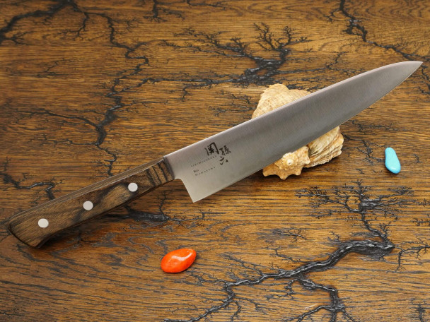 Кухонный нож KAI Momoyama Gyuto AE-5149, нержавеющая сталь 420НС, лезвие 21 см. Кухонный нож KAI Momoyama Gyuto AE-5149, нержавеющая сталь 420НС, лезвие 21 см.